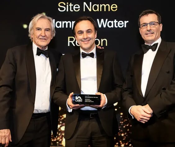 Image of Site Manager of the Year winner, Sean Sadler, receiving his award on stage.